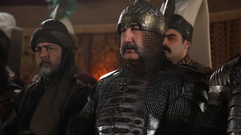 A senior Ottoman commander listens carefully during a tense council scene in Mehmed Fetihler Sultani Episode 71.